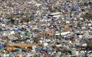 Farm waste and used pesticide containers pile up in a natural water reserve, which has become an illegal dump,according to environmental group Ecologistas en Accion, in El Ejido, south-east Spain